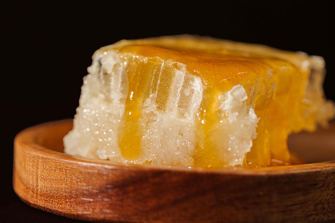 H&M Manuka Honeycomb on a wooden dish