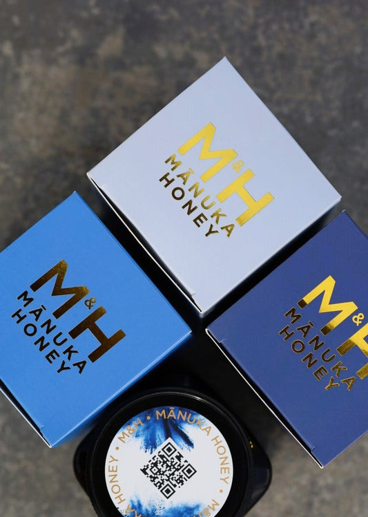 Beautifully packaged jars and boxes of NZ Manuka Honey from M&H