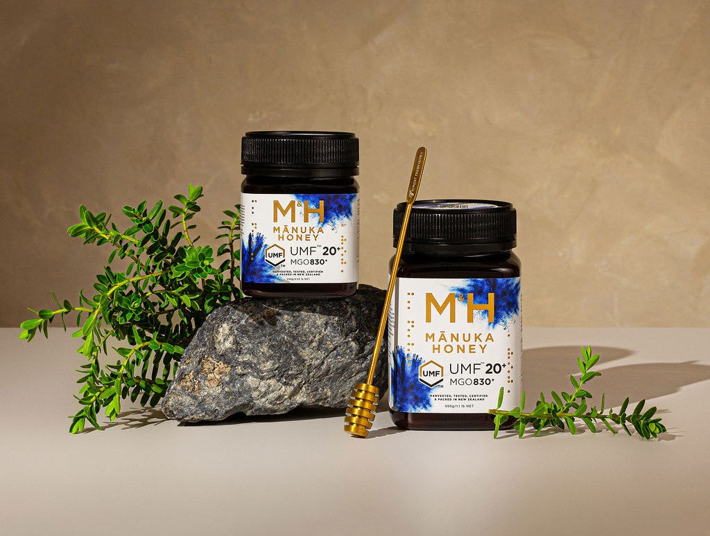 two jars of manuka honey M&H manuka honey - UMF 20 MGO 830