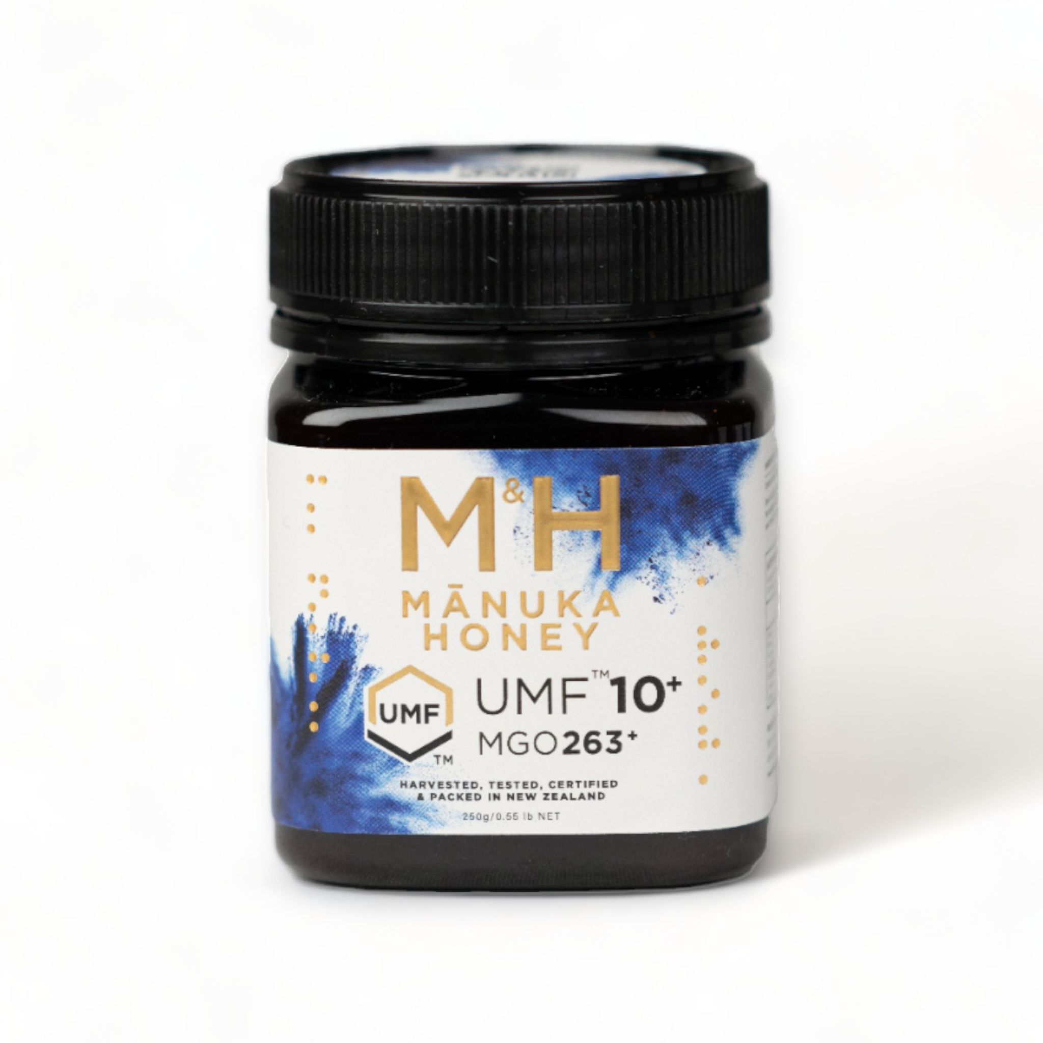 A jar of M&H Manuka Honey with UMF 10+ and MGO263+ labels, indicating its quality and authenticity as a health supplement.