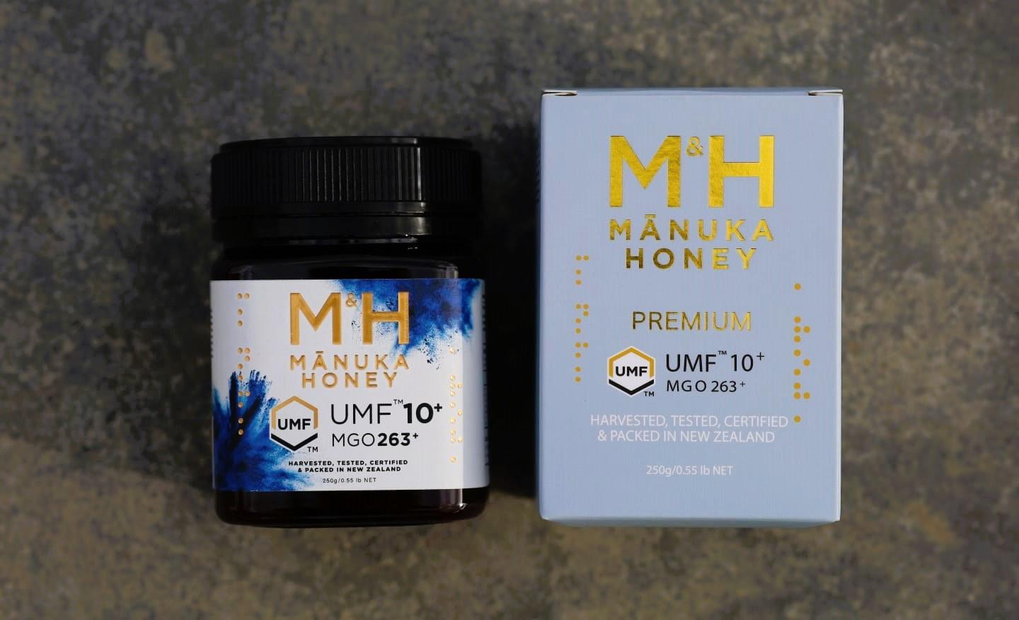 M&H Manuka Honey jar and box on a textured surface
